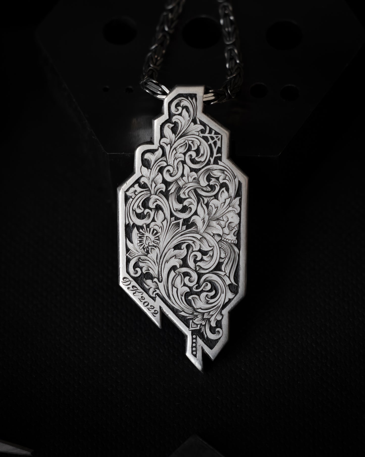 Sterling Silver pendant, hand engraved back